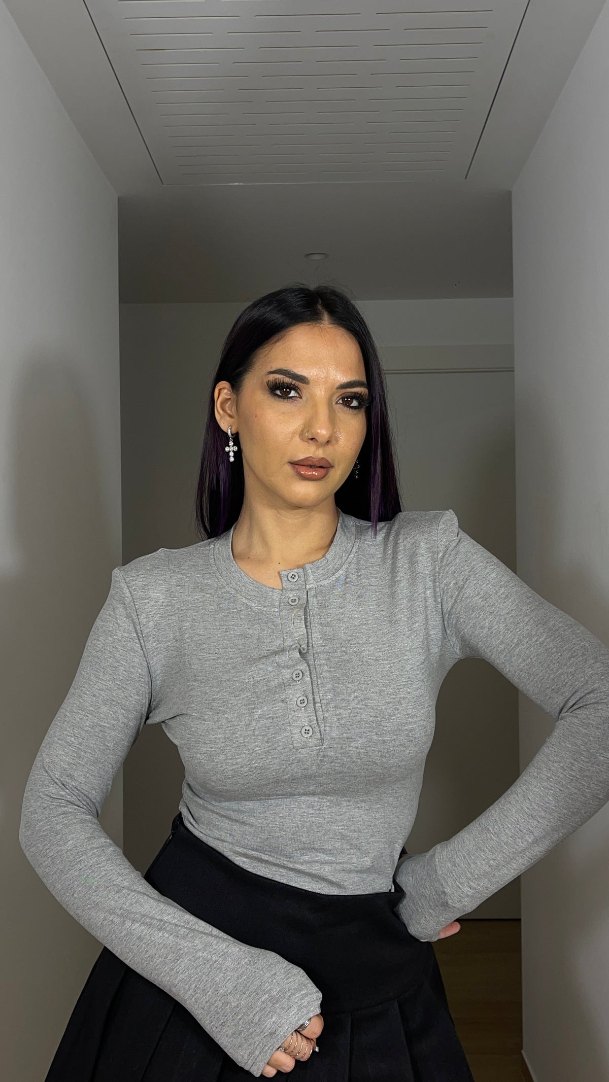 Maglia aderente con spalline