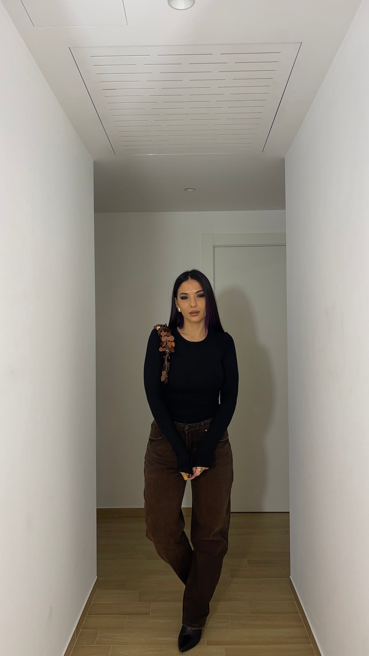 Jeans marrone con sfumature nere